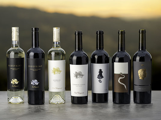 6 Lail Vineyards wine bottles lined up next to each other